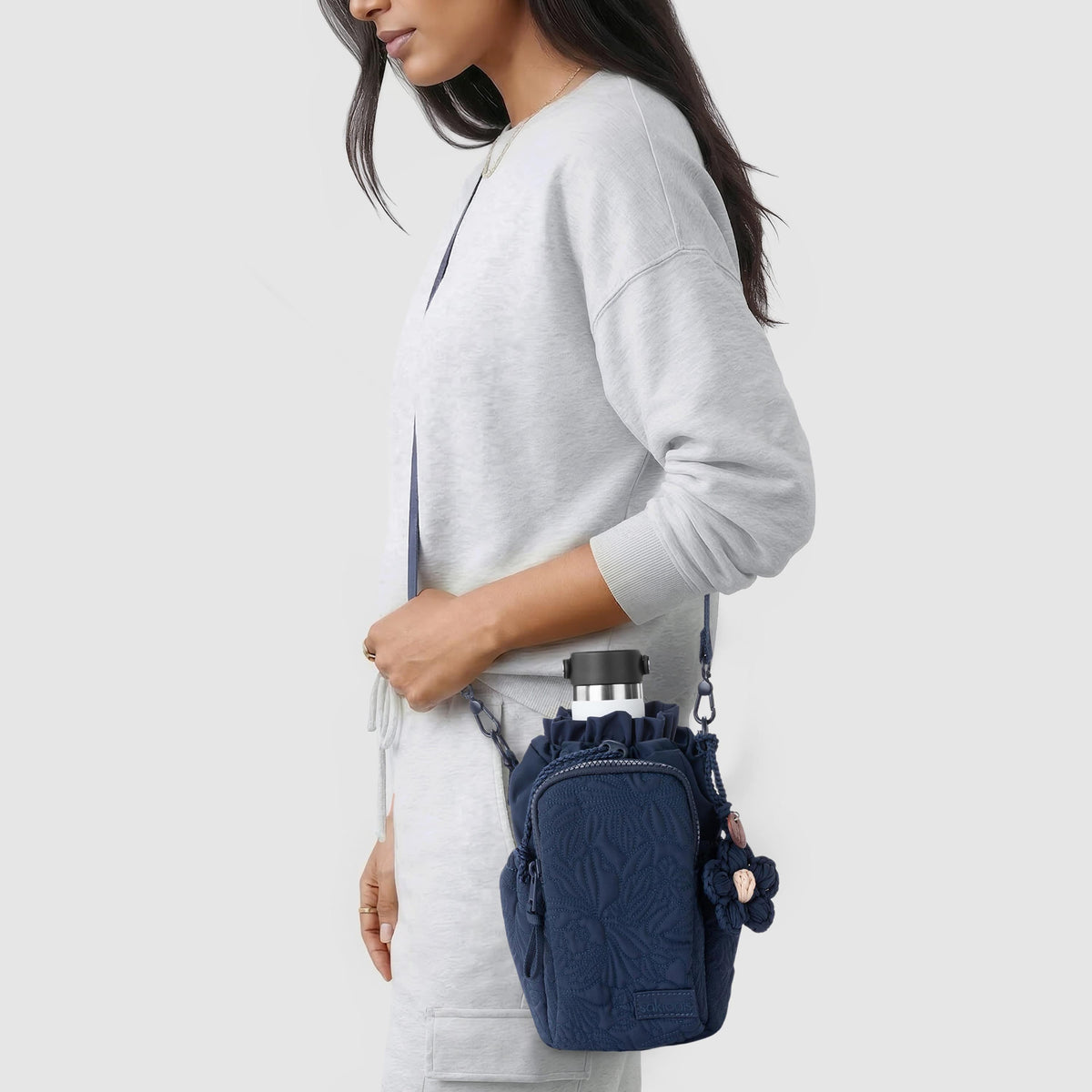 Sakroots Banyan Drawstring Crossbody - EcoTwill - Navy Flower Blossom Quilted