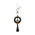 The Sak Yarnicharmz Dangle - Hand Crochet - Black Peace