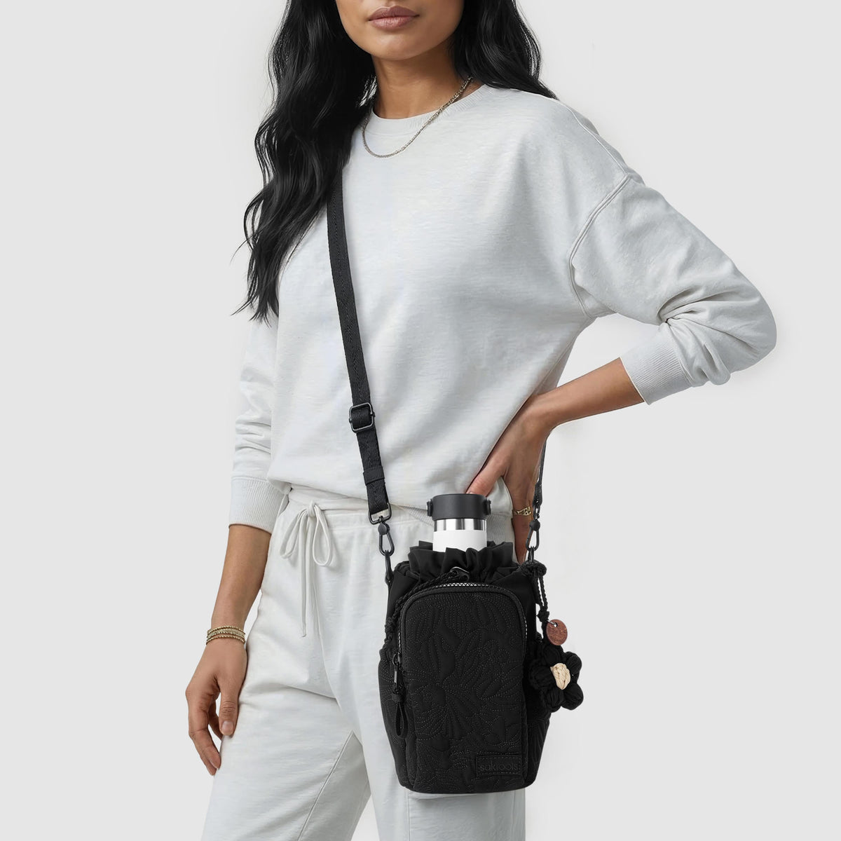 Sakroots Banyan Drawstring Crossbody - EcoTwill - Black Flower Blossom Quilted