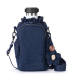 Sakroots Banyan Drawstring Crossbody - EcoTwill - Navy Flower Blossom Quilted